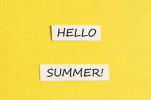 Text hello summer on a yellow background. The concept of summer Stock Photos
