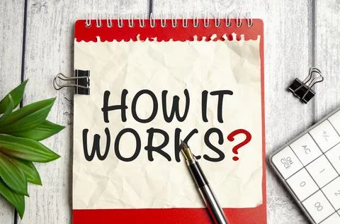 Text How it works on a notebook on the diagram and charts with calculator and Stockfoto's