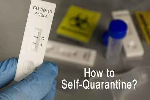 Text on image of Doctor holding a Positive test kit for disease COVID-19. Stock Photos