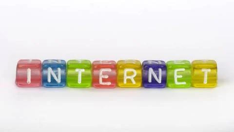Text Internet on colorful cubes Text Internet on colorful cubes over white... Stock-Fotos