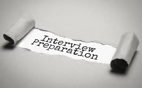 The text Interview Preparation appearing behind torn brown paper Stock Photos