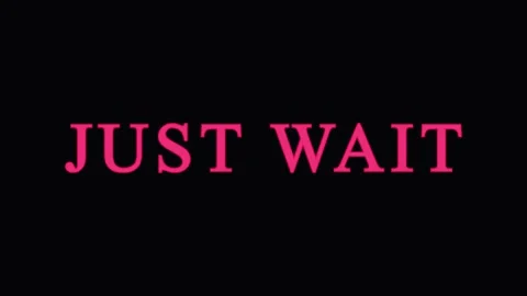 Text 'JUST WAIT' with glitch effects during dark cinematic sequence for sus.. Stock Footage 344036001