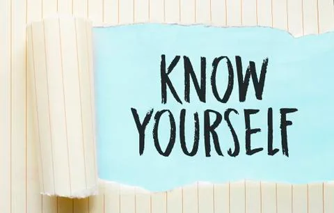 The text KNOW YOURSELF appearing behind torn white paper Stock Photos