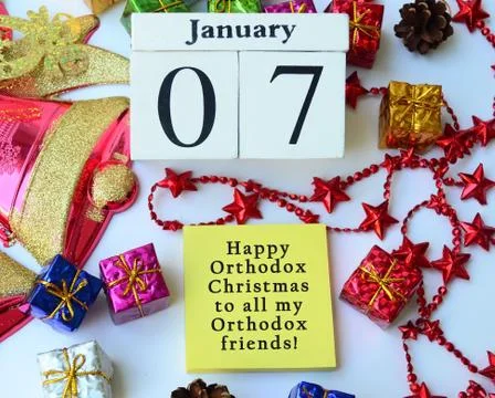 Text label and cube 7th January with Christmas ornament background Stock Photos