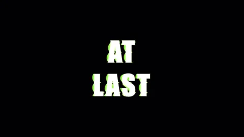 Text 'At Last' with glitch effect during digital transition on black backgrou Video stock 344036885