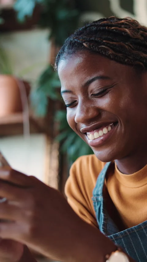 Text, laugh and barista in cafe with phone, funny chat and social media update Stock Footage 342326255