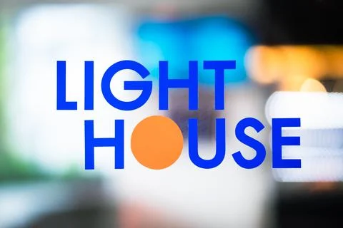 The text LIGHT HOME on the background uses a light effect Stock Photos