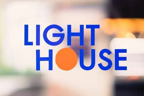 The text LIGHT HOME on the background uses a light effect Stock Photos