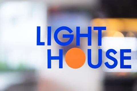 The text LIGHT HOME on the background uses a light effect Stock Photos