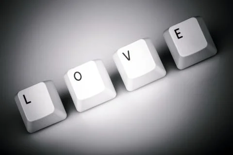 Text love formed with computer keyboard keys on white background Stock Photos