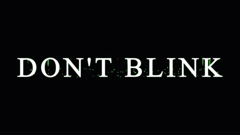 Text message 'DON'T BLINK' repeating on black background during suspenseful.. Stock Footage 345620612