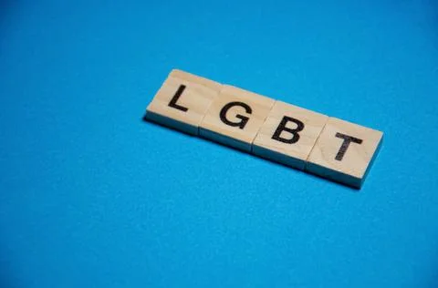 Text message LGBT for protest action. Selective focus on Lettering LGBT. Stock Photos