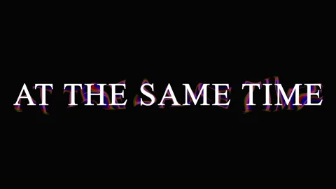 Text message AT THE SAME TIME appearing in purple neon light on black backg.. 스톡 동영상 344036022