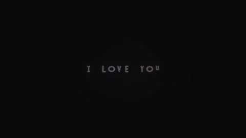 Text message showing I love you on a black background Stock Footage 339373048