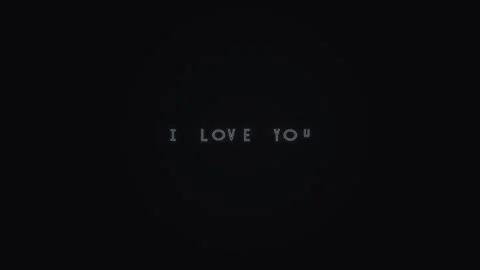 Text message shows I love you on a dark background Stock Footage 339372707