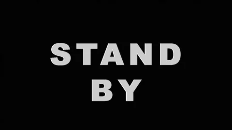 Text message Stand By appearing in sequence with electronic glitch effect o.. Video stock 343416071