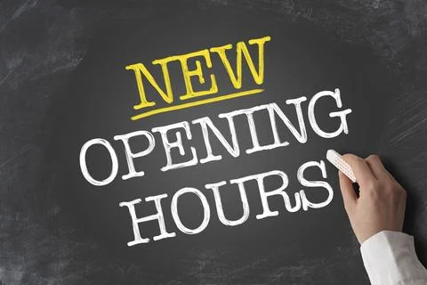 Text NEW OPENING HOURS written on blackboard with hand holding piece of chalk Stock Illustration