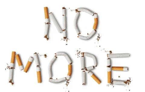 Text ''NO MORE'' made from broken cigarettes Stock Photos