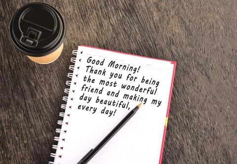 Text on notepad with background of cup of coffee and a pen Stock Photos