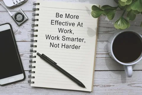 Text on notepad with cup of coffee, smart phone, music player and pen. Foto stock