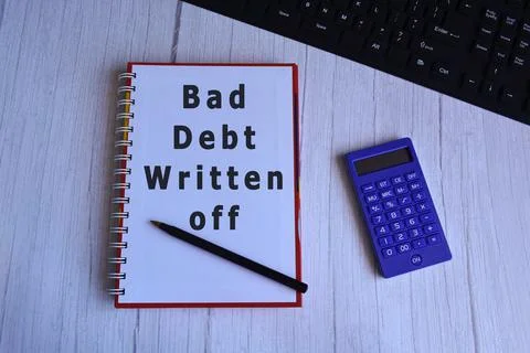 Text on notepad with pen, calculator and keyboard Stock Photos