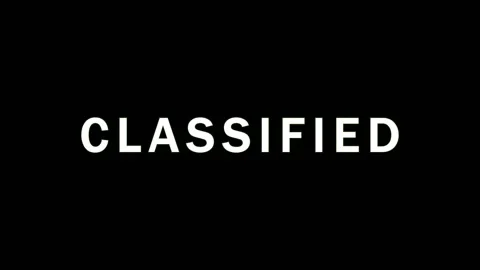 Text overlay CLASSIFIED on black background with subtle cinematic motion an.. Stock Footage 343479009