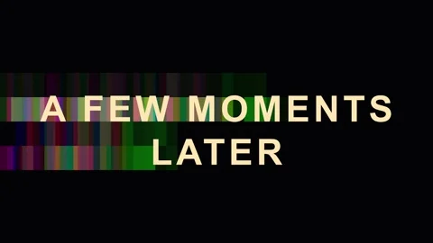 Text overlay 'A few moments later' with glitch effect during a cinematic se.. Stock Footage 343417807