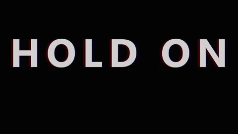 Text overlay HOLD ON repeatedly on black background with subtle cinematic m.. Video stock 343408950