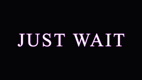 Text overlay 'JUST WAIT' repeats in dark environment symbolizing anticipati.. Stock Footage 344036063
