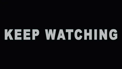 Text overlay Keep Watching repeated on black background during dynamic moti.. Stock Footage 344032375