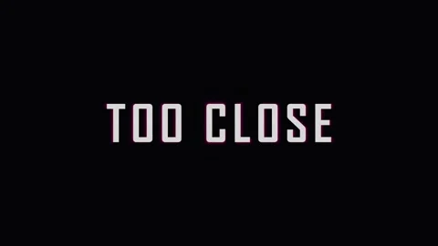 Text overlay TOO CLOSE in cinematic motion against dark background with sub.. Video stock 344286231