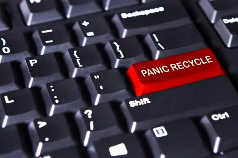 Text of panic recycles on the red button Stock Photos