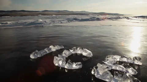 The text of the pieces of ice on the surface of the cold Lake Baikal Stock Footage 53066061