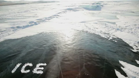 The text of the pieces of ice on the surface of the cold Lake Baikal Video stock 53066231