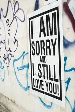 Text poster glued to the wall. I love You. Text poster glued to the wall. ... Stock Photos
