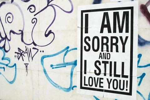 Text poster glued to the wall. I love You. Text poster glued to the wall. ... Stock Photos