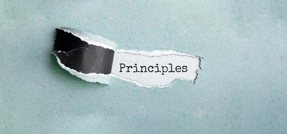 The text PRINCIPLES appearing behind torn green paper Stock Photos