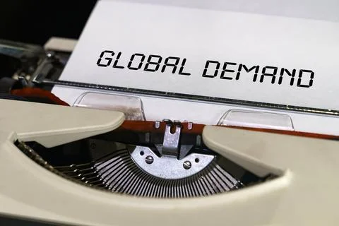 The text is printed on a typewriter - global demand Fotos de archivo