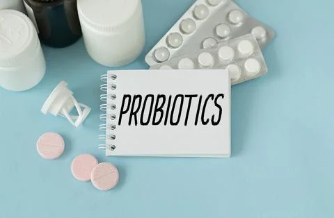 The text probiotics text on a notebook on the doctor's desk next to it is a.. Stock Photos