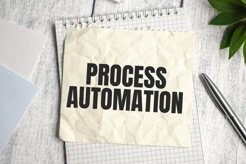 Text PROCESS AUTOMATION on Office desk on wooden background 스톡 사진