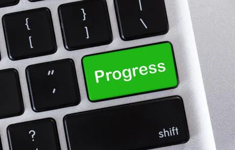 Text Progress on green button of computer keyboard Stock Photos
