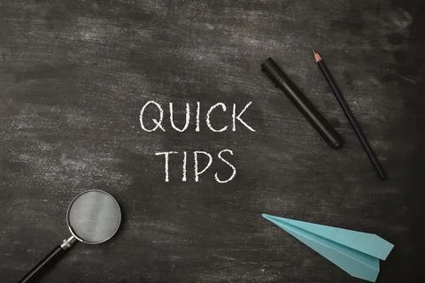 Text Quick Tips chalk on blackboard top view Stock Photos