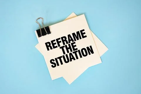 Text REFRAME THE SITUATION on sticky notes with copy space and paper clip i.. Stock Photos