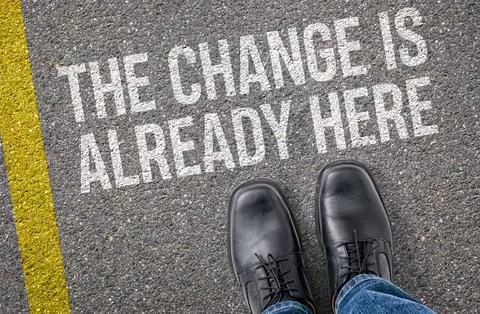 Text on the road - The Change Is Already Here 스톡 사진