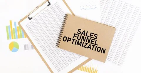 Text sales funnel optimization on brown paper notepad on the table with dia.. Stock Photos