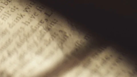 Text From Scripture Floating In and Out of Focus. Bible and scripture Stock Footage 107254002