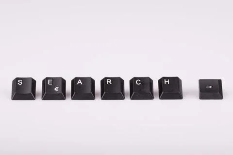 Text search formed with computer keyboard keys on white background Stock Photos