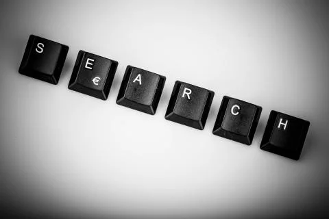 Text search formed with computer keyboard keys on white background Stock Photos