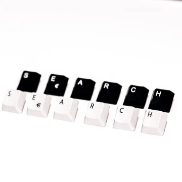 Text search formed with computer keyboard keys on white background Stock Photos