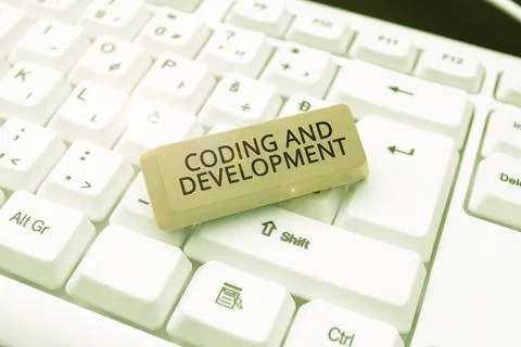 Text showing inspiration Coding And Development. Business showcase Programming Stock Photos